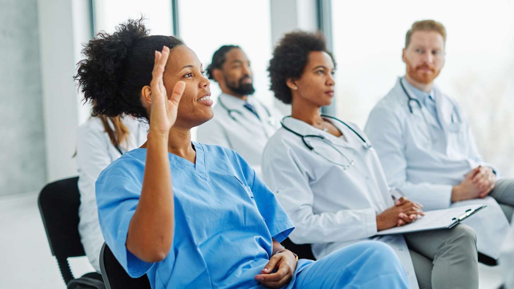Portrait,Of,A,Young,Doctors,And,Nurses,In,Audiance,During