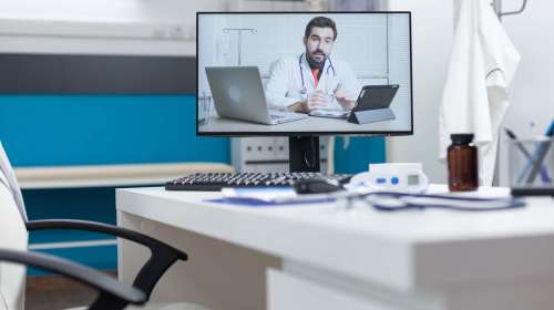 Computer,Screen,With,Remote,Doctor,Having,Online,Videocall,Meeting,Conference
