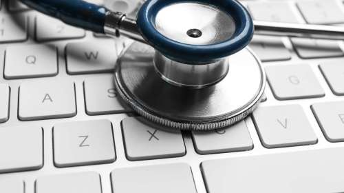 Stethoscope,On,Keyboard,,Closeup.,Concept,Of,Technical,Support